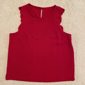 Red sleeveless tank blouse size XS/small with Scalloped detailing.